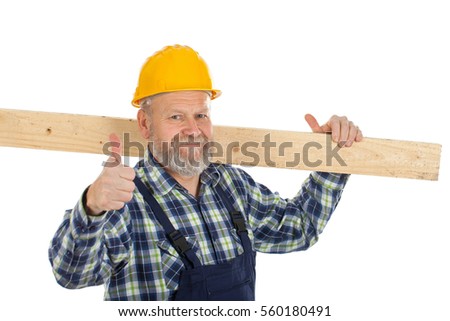 Picture of a confident engineer holding a lath showing thumbs up