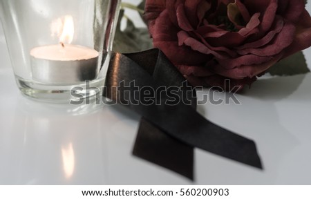  flowers, black ribbons, candles, for mourning