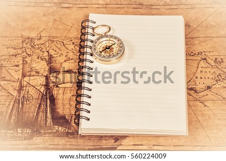 compass on the note book