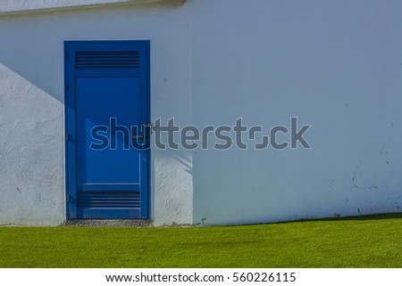 Fuerteventura. blue door and white wall 