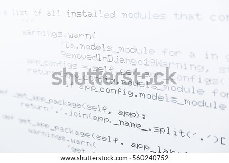 Developer's programming code printed on a white metal surface. Information technology background