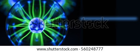 Electricity fire-ball. Abstract photo of electric waves. Static electricity Royalty-Free Stock Photo #560248777
