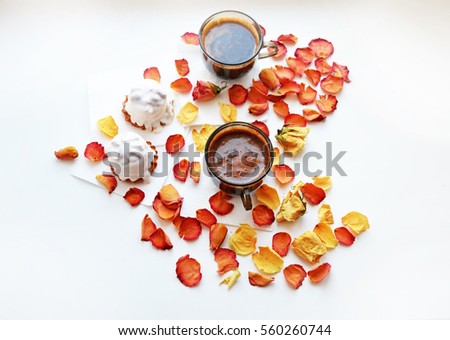Day of valentina.Romantika.Vnimanie. Tasty dessert. Morning coffee with rose petals. Cakes, coffee, rose petals on white background, space for text, International Women's Day