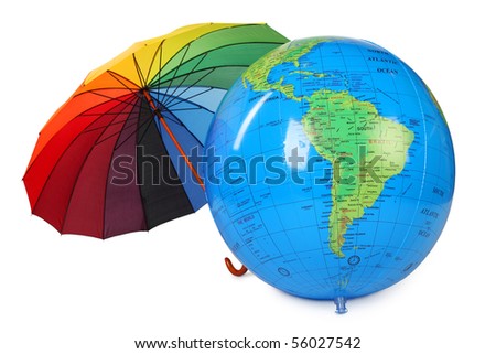 big inflatable globe and colored umbrella isolated on white background