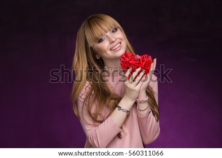 cute blonde girl black and purple background with straw-red heart