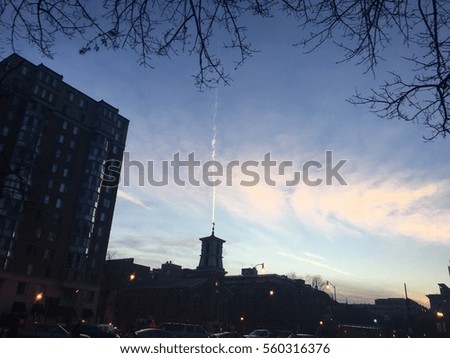 sunset religious scene - clouds touching church