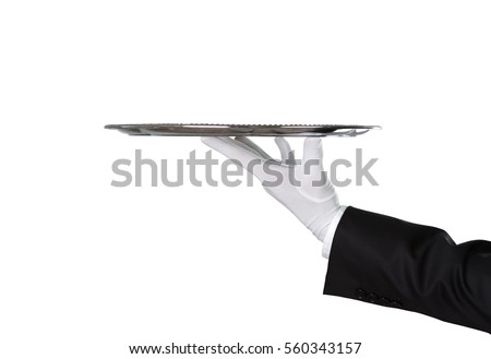 Waiter holding empty silver tray isolated on white background with copy space Royalty-Free Stock Photo #560343157
