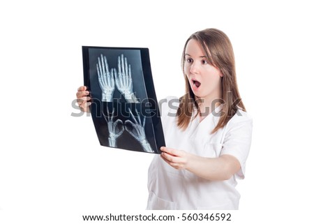 
Nurse or doctor with a radiography in hands isolated on white background