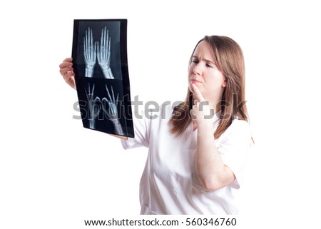 
Nurse or doctor with a radiography in hands isolated on white background