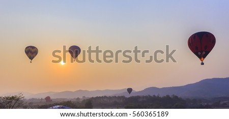 silhouette of balloon with sunset 