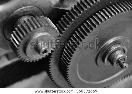 Gear of Obsolete Lathe. Mechanical Structure. Gear Engagement. Black-and-white photo.