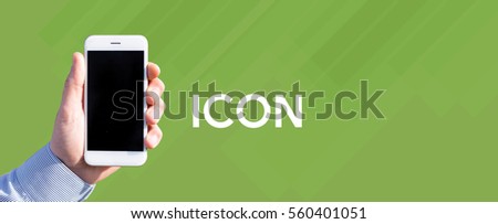 Smart phone in hand front of green background and written ICON