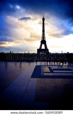 Color blue sky black and white photo of the Eiffel Tower of Paris