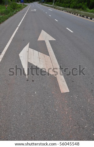 separate arrow on the road