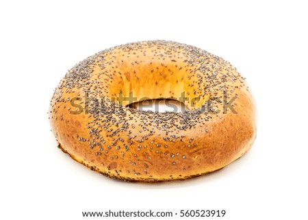 Fresh sweet bagel with poppy grain, isolated, photo