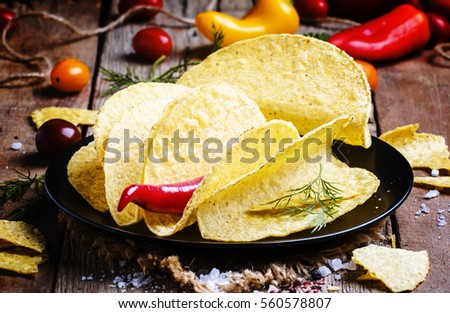 Tacos on plate. Vintage wood background, selective focus
