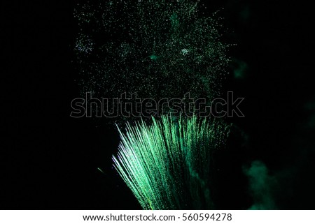 Brightly Colorful Fireworks on twilight background  night dark sky with dazzling display, 4th of July, New Year celebration fireworks isolated, sparkles, stars and twinkles. The end of the Festival