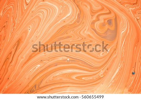 Yellow and red paints. Unique marble surface. Abstract painted waves. Creative art illustration. Bright colors. Horizontal wallpaper.