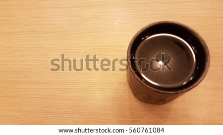 reflection of lantern in  a tea cup. this picture is wallpaper or background.