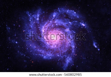 Spiral Galaxy - Elements of This Image Furnished by NASA Royalty-Free Stock Photo #560802985