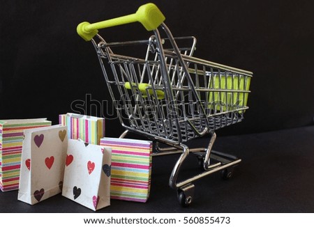 SALE poster with carts and shopping bags