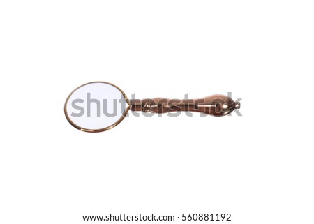 Gold rarity reading magnifier. Decorative magnifying glass on a white background.