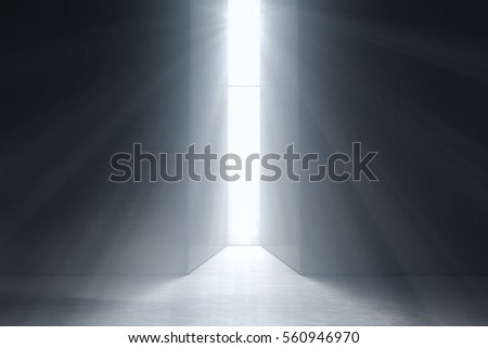 Abstract dark concrete interior with glowing doorway and God light rays coming in. Business Concept. 3d rendering Royalty-Free Stock Photo #560946970