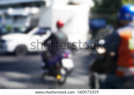 Blurred background abstract and can be illustration to article of Bikers driving a motorcycle