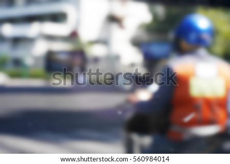 Blurred background abstract and can be illustration to article of Bikers driving a motorcycle