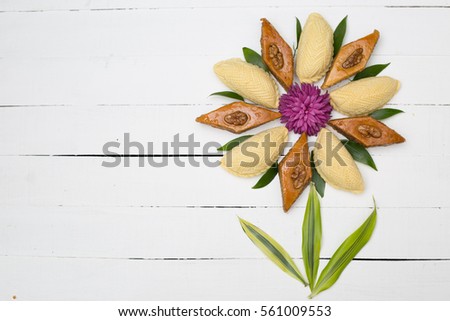 Flower made from national Azerbaijani Nowruz, Novruz sweets pakhlava and shekerbura 