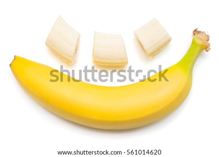 Banana clown with a slice isolated on white background. Flat lay, top view Royalty-Free Stock Photo #561014620