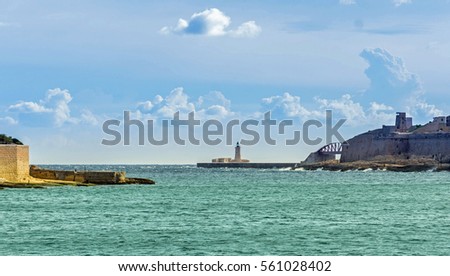 impressive picture of the harbor entrance - ocean and clouds