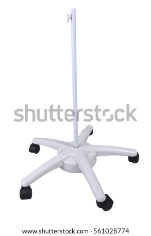 Stand mobile on wheels with a weighting agent for fixing the lamp. Floor stand lamp and magnifying glass on a white background.