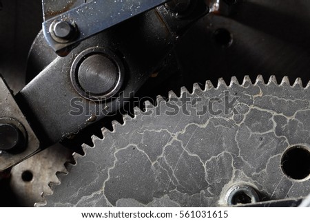 Old dirty gearwheel in work.