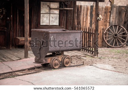 Metal mining cart for silver transportation in Calico, ghost town, in USA Royalty-Free Stock Photo #561065572