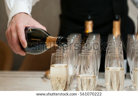 Champagne poured into glasses