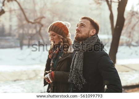 Young Unhappy Depressed Couple Royalty-Free Stock Photo #561099793