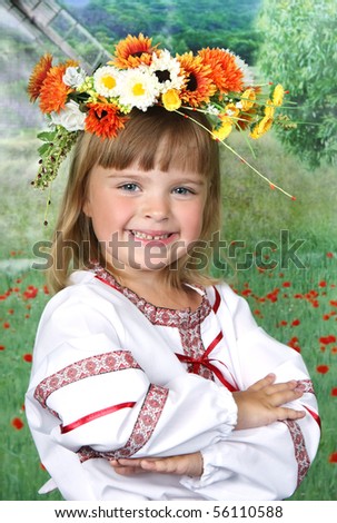 cute girl in national dress and a wreath