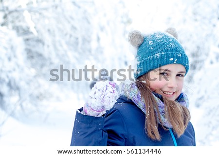 Pretty young girl in winter