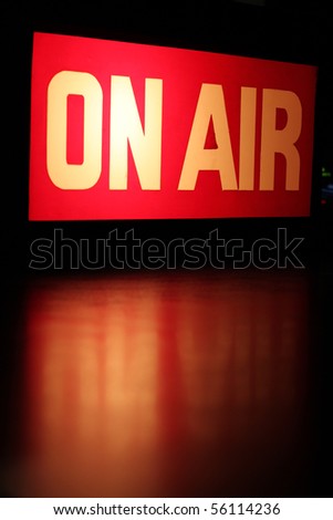 On-Air studio sign glowing with red reflection. Royalty-Free Stock Photo #56114236