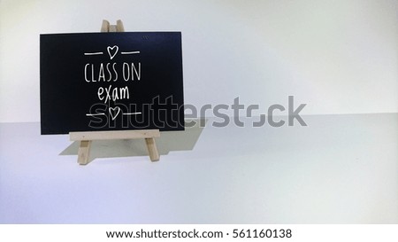 class on exam words on black board with white background