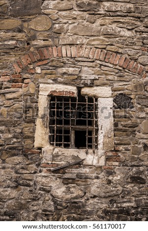 close up shot of a stone wall and window