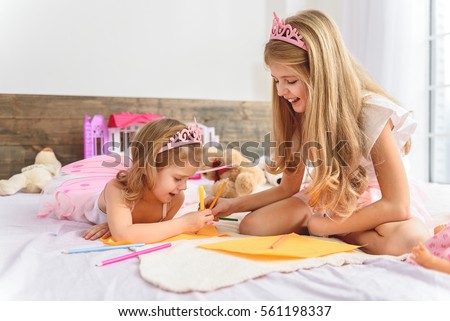 Cheerful kids creating a picture