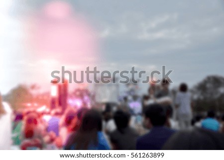 Blurred abstract background of people in festivel