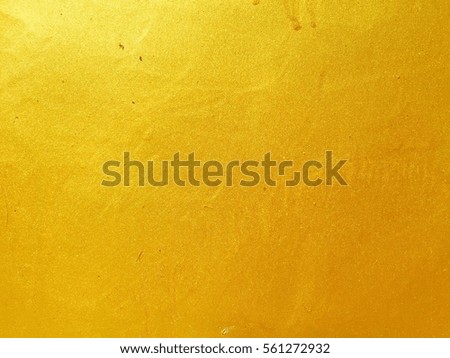 gold or foil color on concrete wall background