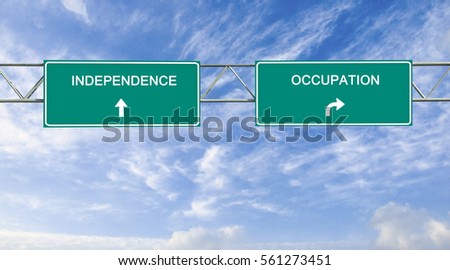 Road sign to independence and occupation