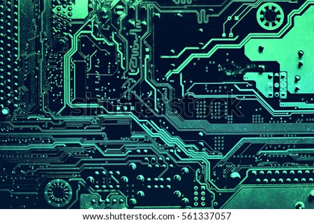 Circuit board. Electronic computer hardware technology. Motherboard digital chip. Tech science background. Integrated communication processor. Information engineering component. Royalty-Free Stock Photo #561337057