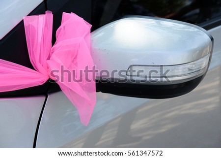 Beautiful decor on a car  for the wedding ceremony