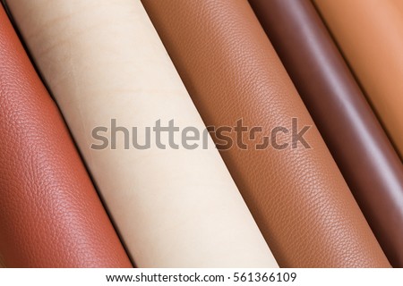 Close up of multicolored rolls of leather. High resolution photo,