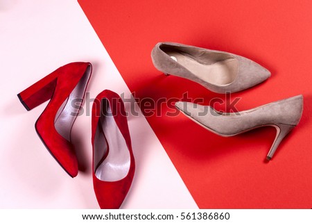 Fashion. Red and pastel female high-heeled shoes. Stylish Trendy heels Summer fashion girl Outfit, Luxury Party shoes, accessories. Hipster Essentials. Minimal fashion concept